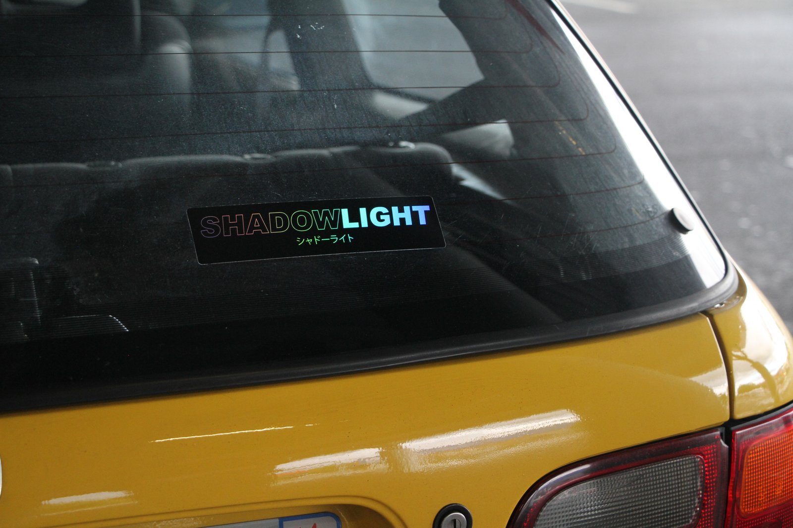 SHADOWLIGHT holographic sticker on car window
