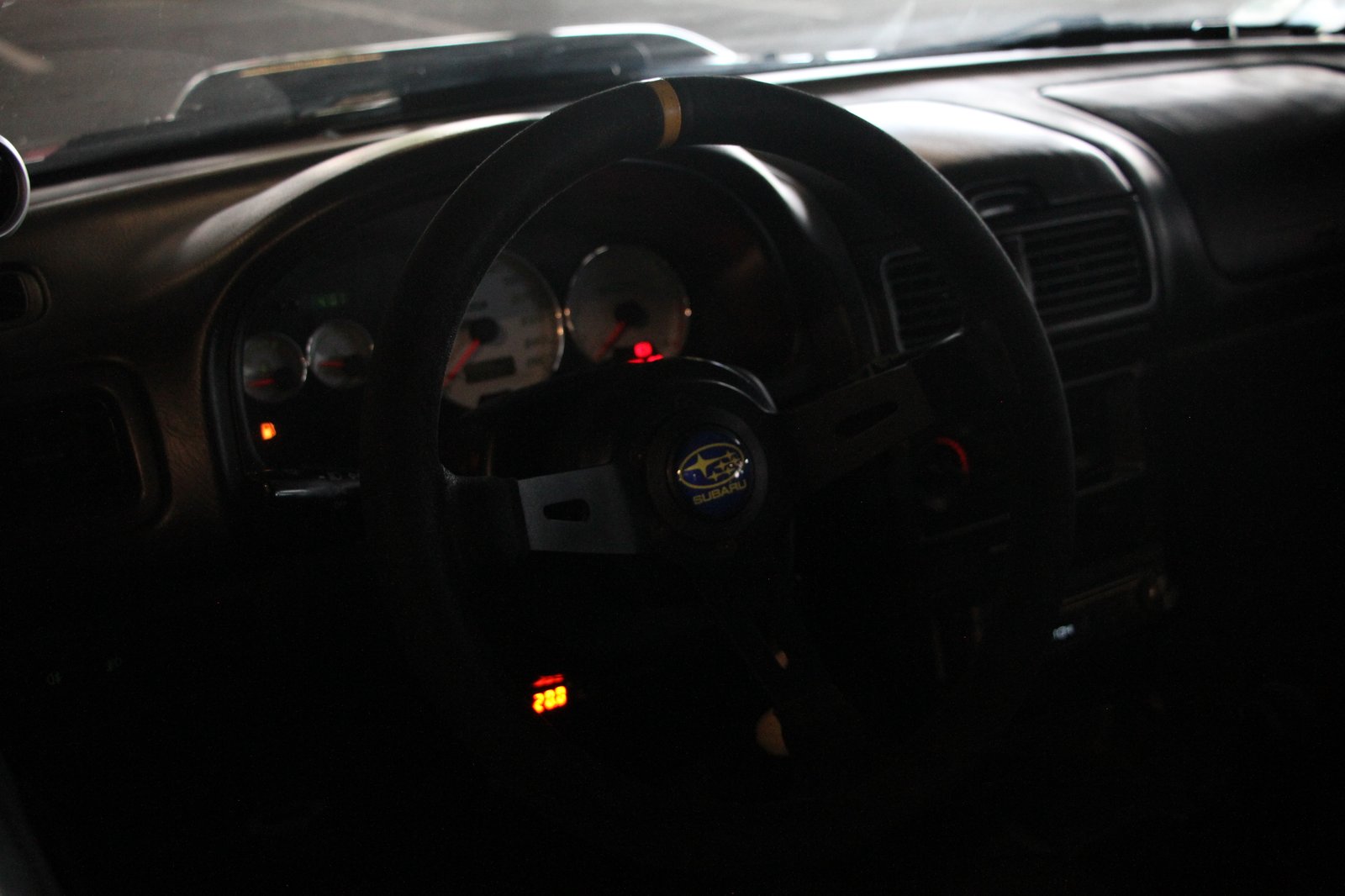 Subaru Impreza interior with Sparco steering wheel